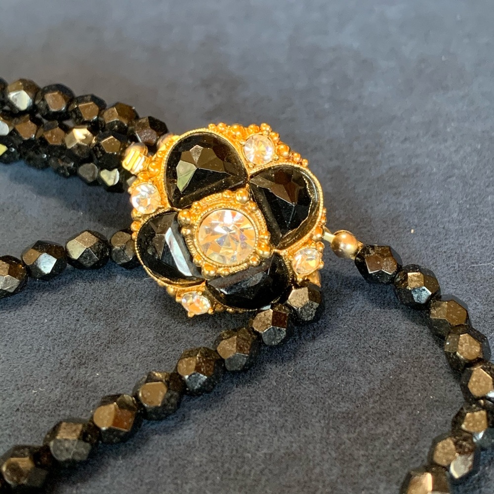 Triple-Strand Black Beads with Medallion Clasp